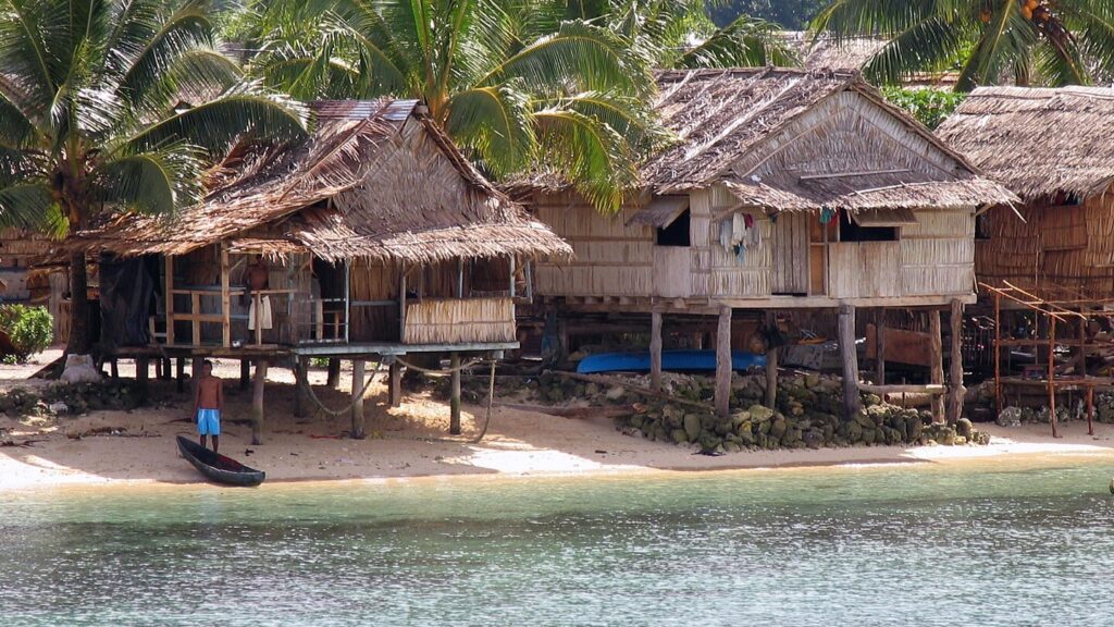 Medium shot of idyllic villages beach near Auki, the capital of Malaita.